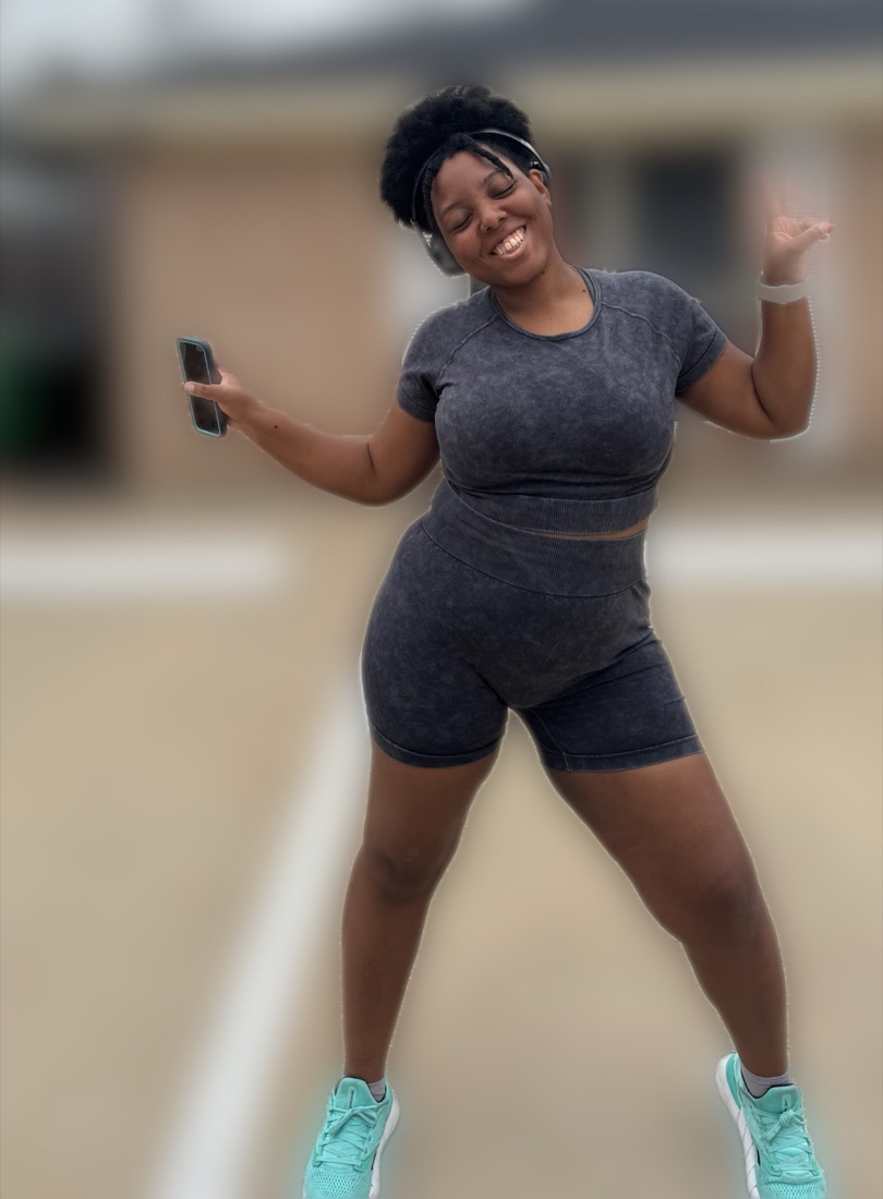 Mya today, dancing in her workout clothes